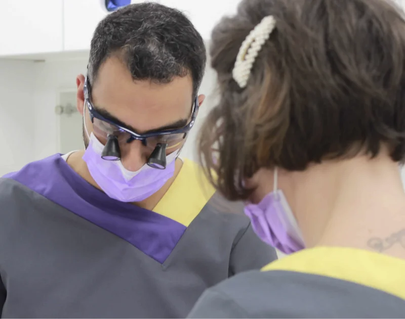 Dr JK caring for a patient at Smileworks