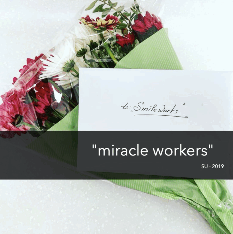 Flowers and a thank-you card at Smileworks