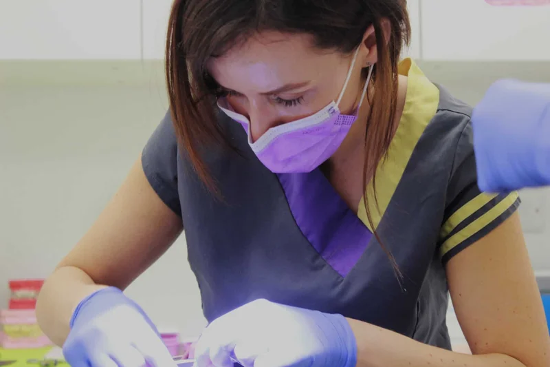 Paula Reed caring for a patient at Smileworks.
