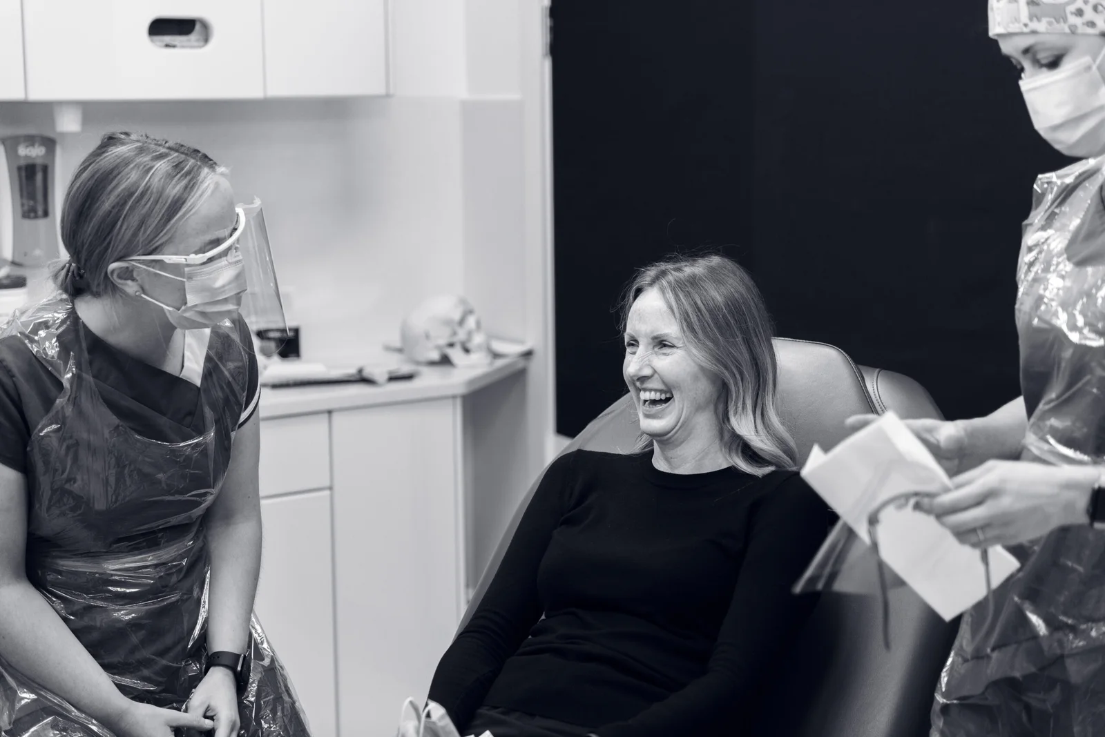 A smiling patient with the Smileworks clinical team